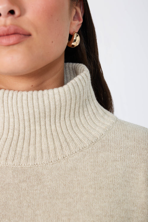 arched polo sweater / sandstone