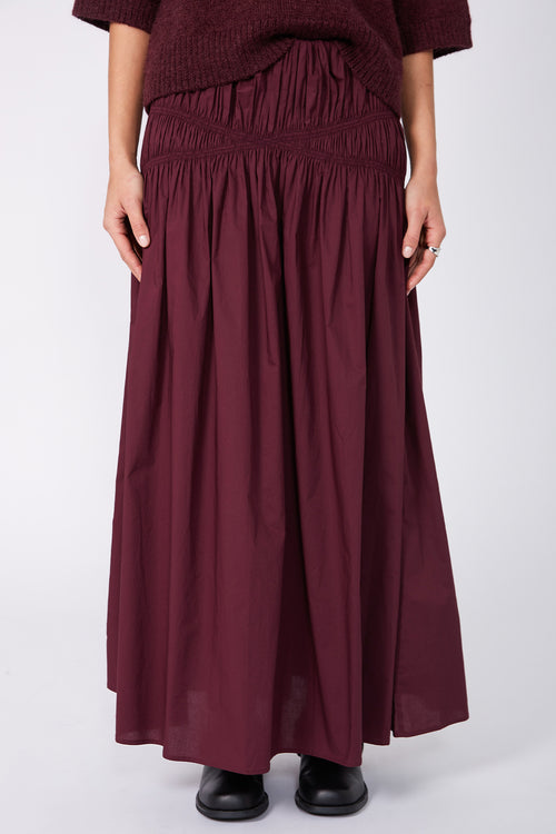 disperse skirt / dark plum